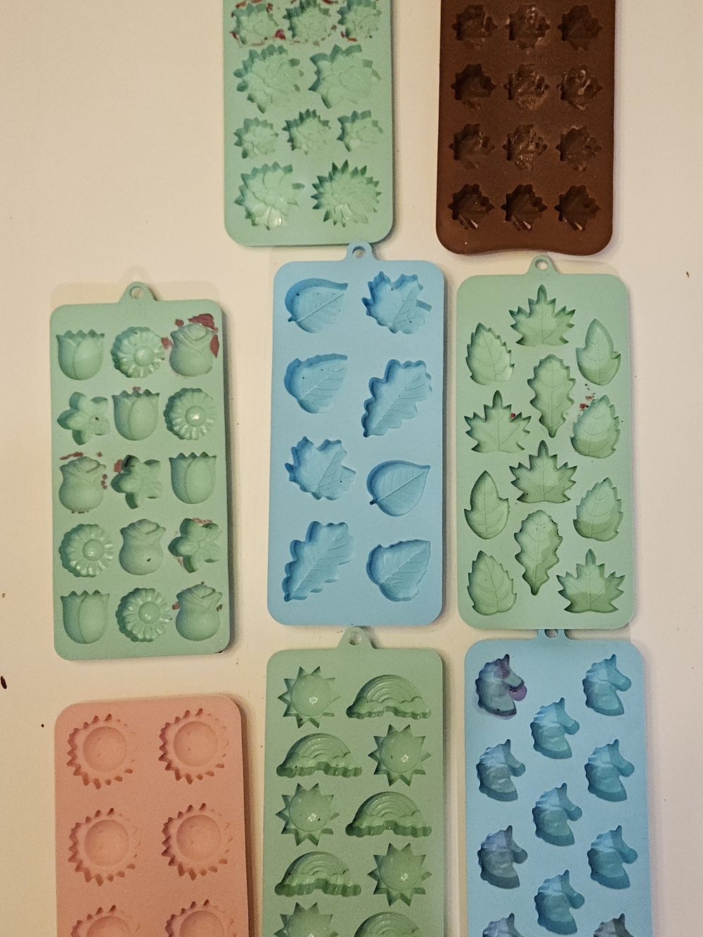 Assorted Leaves, Flowers, Rainbows, Suns And Unicorn Silicone Molds